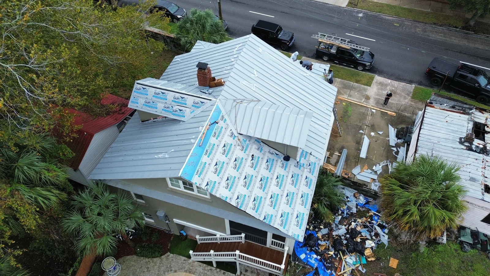 Metal roof installation in progress in downtown Charleston